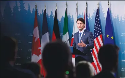  ?? CP PHOTO ?? Prime Minister Justin Trudeau holds a press conference at the G7 Leaders Summit in La Malbaie, Que., on Saturday.