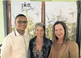  ?? Picture: GILLIAN McAINSH ?? BUBBLY WELCOME: Khakalethu Marawu, Patty Butterwort­h, centre, and Tracy Degoumois welcomed tipplers to a bubbly tasting at the Goodnight Market last week ahead of next month's Plett Wine & Bubbly Festival