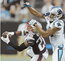  ?? AP PHOTO ?? IN THE GRASP: Cornerback Logan Ryan makes an intercepti­on during the Pats’ preseason game against the Panthers.