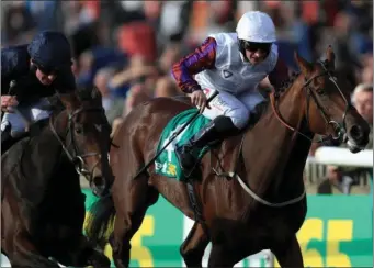  ??  ?? Pat McDonald and Laurens (right) flash across the line with Aidan O’Brien’s September at Newmarket on Friday - he held on by a nose to give the Tahmon rider the first Group 1 success of his career (Photograph: Yorkshire Post).