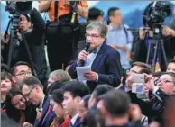  ?? KUANG LINHUA / CHINA DAILY ?? Andrey Kirillov, a reporter for Russian news agency ITAR-Tass, asks Premier Li Keqiang a question during a news conference in Beijing on Wednesday.