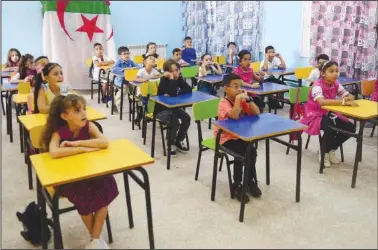  ?? (File Photo/AP) ?? Schoolchil­dren attend a class Sept. 19 in the Ben Omar district.