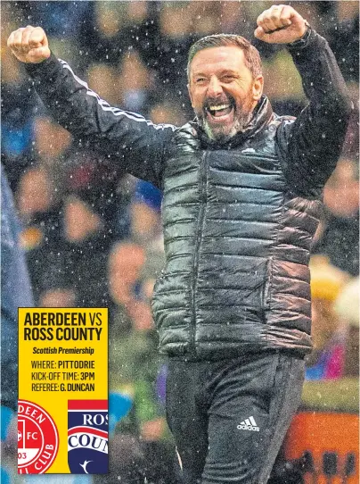  ??  ?? HIGH DRAMA: Aberdeen boss Derek McInnes celebrates his team’s battling victory at Rugby Park on Wednesday