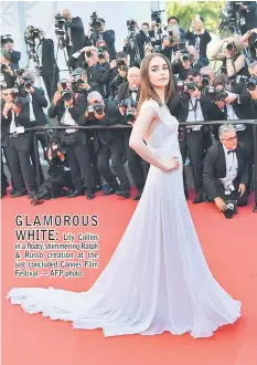  ??  ?? Lily Collins in a floaty, shimmering Ralph & Russo creation at the just concluded Cannes Film Festival. — AFP photo