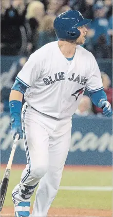  ?? FRED THORNHILL THE CANADIAN PRESS ?? Toronto Blue Jays' Justin Smoak watches the ball after hitting a grand slam against the New York Yankees in the eighth inning.