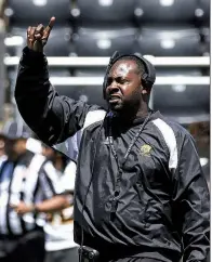  ?? Arkansas Democrat-Gazette/MITCHELL PE MASILUN ?? Arkansas-Pine Bluff Coach Cedric Thomas finished with a 2-9 record in 2018, his first season with the Golden Lions. UAPB is scheduled to play Arkansas in 2021 and 2024, the schools announced Wednesday.