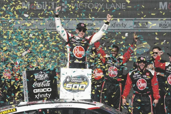  ?? DARRYL WEBB/AP ?? celebrates after his Cup Series auto race win at Phoenix Raceway on Sunday in Avondale.