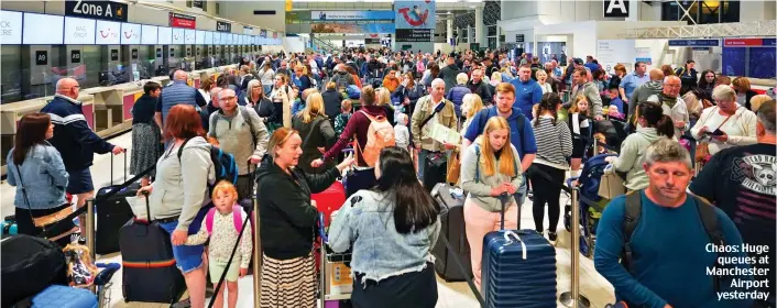  ?? ?? Chaos: Huge queues at Manchester Airport yesterday