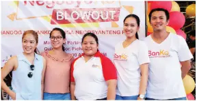  ??  ?? BPI corporate affairs and communicat­ions’ Joey Silvestre (extreme left) and BanKo marketing and customer experience head Sacha M. Camus (center) with members of the BanKo team