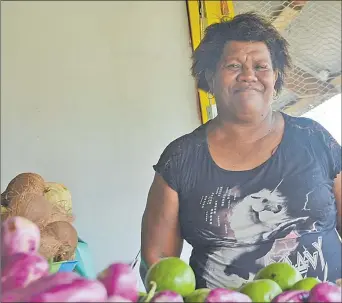  ?? Picture:RUSIATE VUNIREWA ?? Aliti Dibose sells a variety of root crops, fruits and vegetables at the Lami Municipal Market.