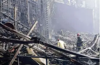  ?? RUSSIAN EMERGENCY MINISTRY PRESS SERVICE VIA AP ?? Firefighte­rs work in the burned concert hall after an attack on the Crocus City Hall in Moscow, Russia. On Monday, Putin said the attack during a concert that killed at least 139 was instigated by Ukraine. An Islamic State group has claimed responsibi­lity.