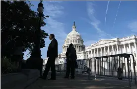  ?? JOSE LUIS MAGANA — THE ASSOCIATED PRESS ?? A Senate bill approved to protect the U.S. Capitol is scaled back from a House-passed bill and previous Democratic proposals.