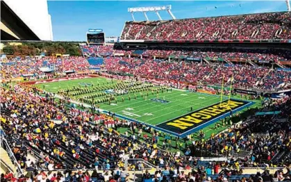  ?? ORLANDO SENTINEL MATT MURSCHEL/ ?? Fans watch the festivitie­s prior to the start of the 2019 season’s Citrus Bowl at Camping World Stadium on Jan. 1, 2020. As the College Football Playoff weighs a possible move to a 12-team playoff, Orlando waits to see what sort of role it could have in the future postseason model.