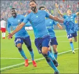  ?? REUTERS ?? ▪ Marseille's Rolando celebrates his goal against Salzburg in the Europa League semifinal on Thursday.