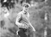  ?? MADDIE MEYER/GETTY IMAGES ?? Jordan Spieth shot a 1-under 69 on Friday to maintain a 1-shot lead at TPC River Highlands in Connecticu­t.