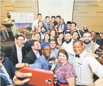  ??  ?? Delegates from all over the world take a wefie together at the JCI Internatio­nal Summit on Peace.