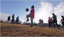  ?? ERIC GAY/ASSOCIATED PRESS FILE ?? Children play at a holding center in Corrizo Springs, Texas, last month. A panel dismissed a challenge to a lower court ruling that authoritie­s failed to provide safe conditions for detained children.