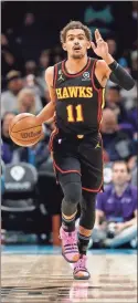  ?? USA Today Sports - Brian Westerholt ?? Trae Young said he had “nothing but love” for Nate McMillan amid speculatio­n that Young’s frustratio­n led to McMillan’s firing as the Hawks’ coach.