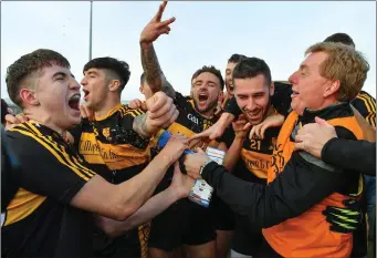  ??  ?? Dr Crokes selector Vince Casey celebrates the county final win over Dingle at Austin Stack Park with, from left, Jordan Kiely, Tony Brosnan, Micheál Burns and Paul Clarke. Photo by Sportsfile