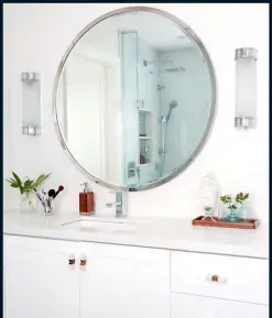  ??  ?? RIGHT Updated finishes give the ensuite bathroom a spa-like feel. Turquoise tiling in the shower echoes the touches of blue featured throughout the house. Silver Satin OC-26 WALL PAINT, Benjamin Moore; VANITY, COUNTERTOP, FAUCET, Plumbing and Parts...