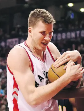  ?? FRANK GUNN / THE CANADIAN PRESS ?? Toronto Raptors centre Jakob Poeltl, the team’s top pick in the 2016 draft, is seeing more playing time as the season has progressed.