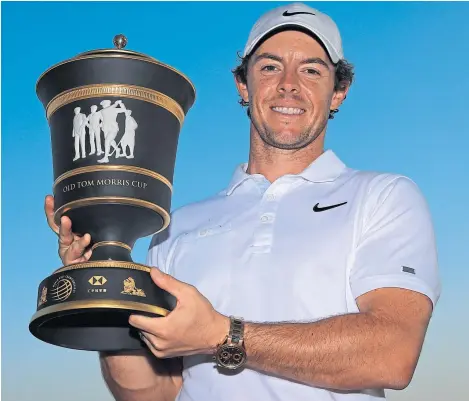  ?? Picture: Getty. ?? World No 2 Rory McIlroy with the WGC-HSBC Champions trophy – his fourth win of 2019.