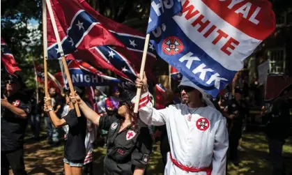  ?? ?? The Ku Klux Klan protests on 8 July 2017 in Charlottes­ville, Virginia. According to the ADL, McClanahan wrote for a Klan-linked newsletter ‘about his radicalisa­tion in the wake of the Unite the Right rally in 2017’. Photograph: Chet Strange/Getty Images