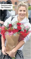  ??  ?? Gemma with her flowers