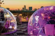  ?? COURTESY OF THE ROOF AT PONCE CITY MARKET ?? The Roof at Ponce City Market will feature private igloos and an ice skating rink.