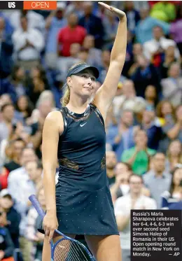  ??  ?? Russia’s Maria Sharapova celebrates her 6-4, 4-6, 6-3 win over second seed Simona Halep of Romania in their US Open opening round match in New York on Monday. — AP