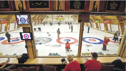  ?? — FILES ?? Curling clubs across Canada aren’t pleased that they are now faced with increased costs to keep cable packages from Rogers and Bell on television sets in their respective clubs.