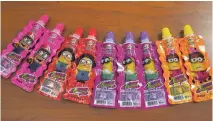  ?? NORMAN GRINDLEY/CHIEF PHOTO EDITOR ?? The CiCi liquid fruit candy comes in colourful packages featuring minions, the fictional yellow creatures that appear in the popular ‘Despicable Me’ movie franchise.