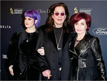  ?? Agencies ?? Kelly (left), Ozzy and Sharon Osbourne. Ozzy is one of Smith’s many musical collaborat­ors.