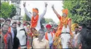  ?? PRABHAKAR SHARMA/HT PHOTO ?? Jan Kranti Dal supporters arrive on a horse to file nomination­s at the collectora­te in Jaipur on Friday.