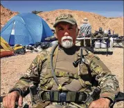  ?? KEN RITTER / ASSOCIATED PRESS 2014 ?? Gerald DeLemus was one of several self-described militia members camping on Cliven Bundy’s ranch near Bunkervill­e, Nev.