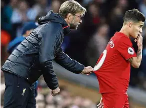  ?? — Reuters ?? Please don’t go: Liverpool manager Juergen Klopp may not be able to hold on to Philippe Coutinho this time.