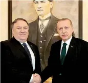  ??  ?? Turkish President Recep Tayyip Erdogan and US Secretary of State Mike Pompeo greet as they pose for a photo during their meeting in Ankara.