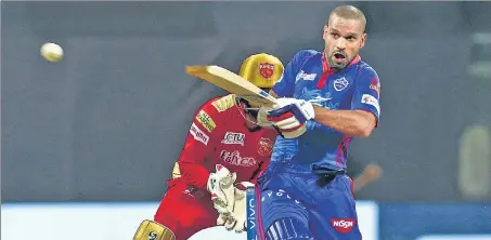  ??  ?? Shikhar Dhawan scored a blistering 92 off 49 balls with 13 fours and two sixes to help Delhi Capitals beat Punjab Kings by six wickets.