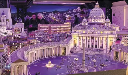  ?? ANDREAS MEICHSNER FOR THE NEW YORK TIMES ?? A model of St. Peter’s Square in Vatican City, part of Miniatur Wunderland, which evolved from a giant model railroad.