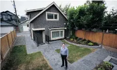  ?? DARRYL DYCK/THE CANADIAN PRESS FILES ?? Laneway homes are just one example of ‘gentle intensific­ation,’ a strategy city planners employ to discreetly densify neighbourh­oods.