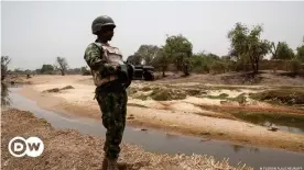  ??  ?? A Nigerian soldier on border patrol duty