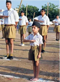  ?? ?? VOLUNTEERS of the RSS participat­e in a drill on the occasion of Dussehra in Ahmedabad on October 6, 2011.