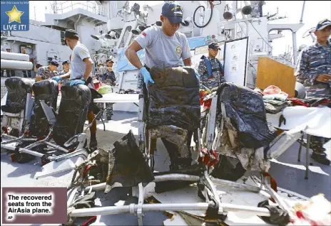  ?? AP ?? The recovered seats from the AirAsia plane.