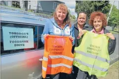  ??  ?? Watch out: Food bank secretary Vivien Horne, left, and volunteers Tania Oneroa and Anne Radford are warning people to look out for the official food bank signs after people have posed as collectors in previous years.