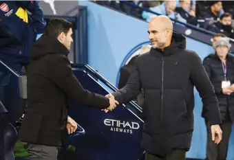  ?? GETTY IMAGES ?? Mikel Arteta (42 anni) e Pep Guardiola (53)