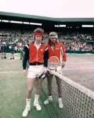  ?? Photograph: Eamonn McCabe/The Guardian ?? Kings of the court: McEnroe with Björn Borg, Wimbledon final, 1980.