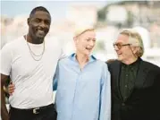  ?? LOIC VENANCE/GETTY-AFP ?? Idris Elba, from left, Tilda Swinton and George Miller are seen May 21 at the Cannes Film Festival.