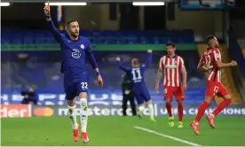  ??  ?? Chelsea’s Hakim Ziyech celebrates after opening the scoring at Stamford Bridge. Photograph: Adam Davy/PA