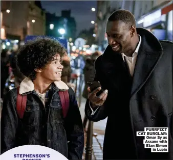  ??  ?? PURRFECT CAT BURGLAR: Omar Sy as Assane with Etan Simon
in Lupin