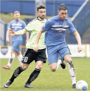  ?? Www.mphotograp­hic.co.uk ?? ●●Harry Winter on the ball for County against Curzon Ashton